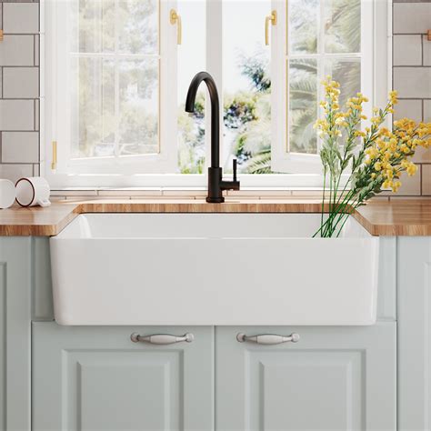 white farmhouse kitchen sink