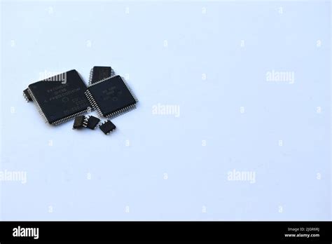 Modern Microchips And Mikroprocessors On A White Background Isolated