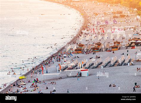 Crowded Antalya City Konyaalti Beach With Hundreds Of Vacationers And