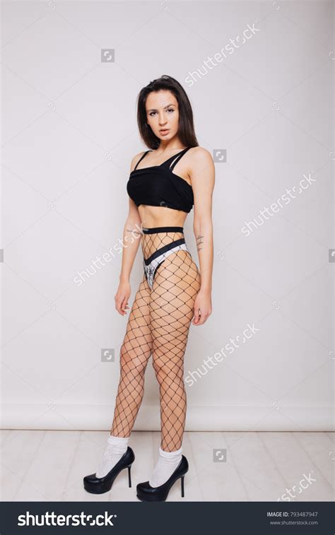 Sexy Brunette Girl Slender Figure Posing Stock Photo