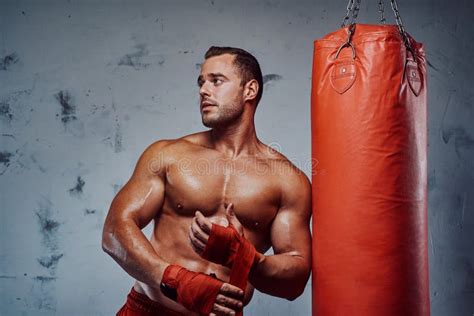 Muscular Boxer With Naked Torso Training With Punching Bag Stock Image Image Of Human