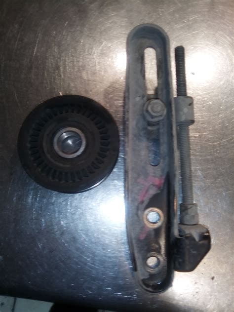 Ролик натяжителя ремня кондиционера. — Subaru Forester (SF), 2 л, 2000 ...