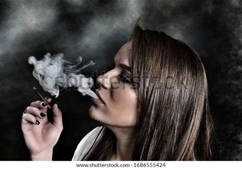 Attractive Brunette Girl Posing Studio Smoking Stock Photo Shutterstock