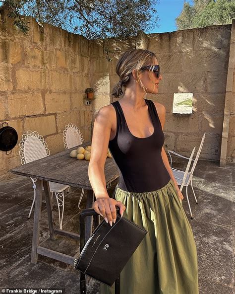 Frankie Bridge Flashes Her Toned Abs In A Black Bikini Top Before Going Braless Beneath A Chic