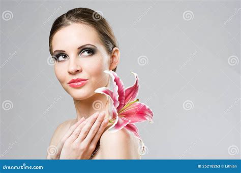 Striking Brunette Beauty With Colorful Lily Stock Image Image Of Relaxed Posing