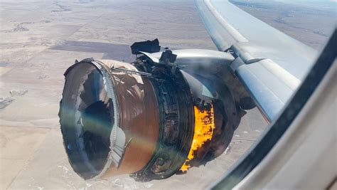 WATCH: Passenger records plane engine catching fire as debris falls to ...