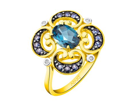 Zlatý prsten s diamanty safíry a topazem London Blue ryzost 585 Zn