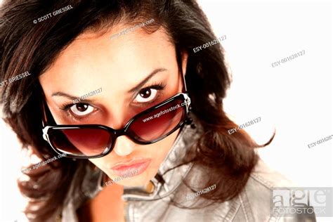 Pretty Latina Woman Looking Over Her Glasses Stock Photo Picture And Low Budget Royalty Free