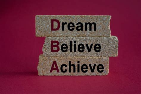 Premium Photo Dream Believe Achieve Symbol Dba Acronym On Brick