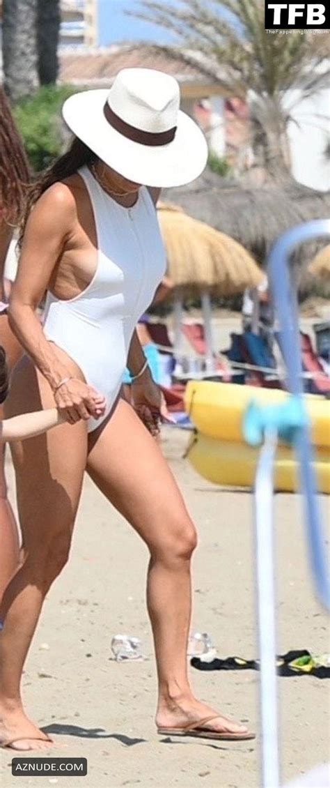 Eva Longoria Sexy Seen Showing Off Her Hot Figure In A White Swimsuit On The Beach In Marbella