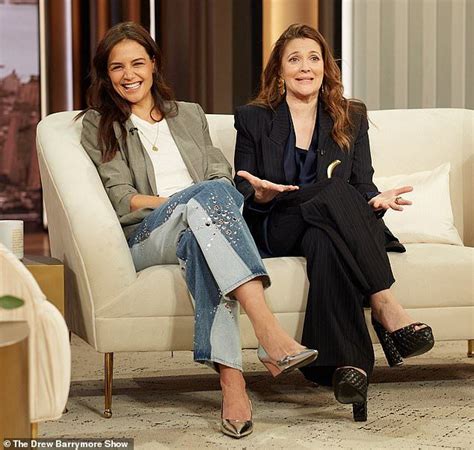 Two Women Sitting On Couches Talking To Each Other