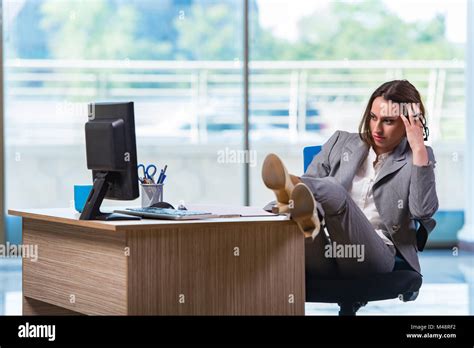 Young Businesswoman Tired After Long Working Day Stock Photo Alamy