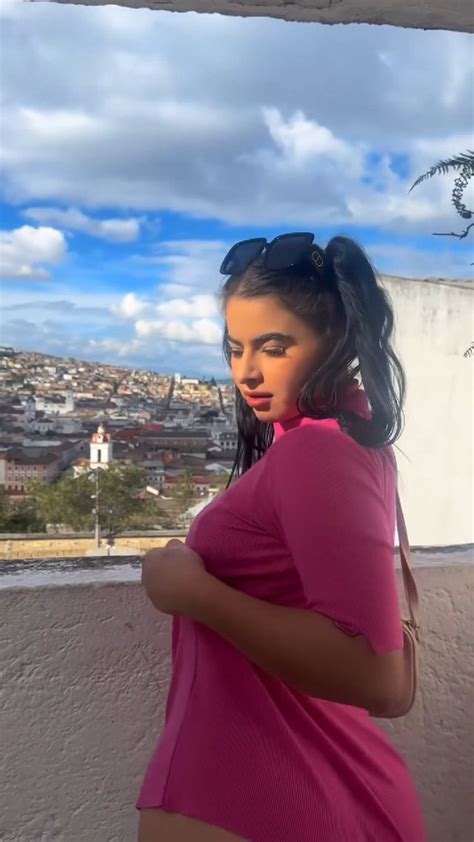 What S The Name Of This Brunette Latina In Pink Dress