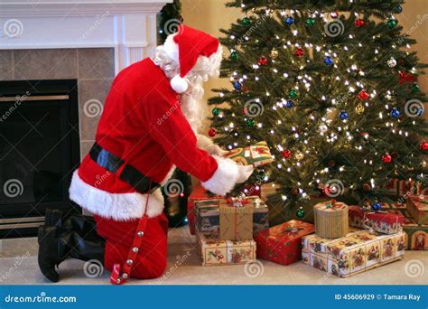 Santa Claus Delivering Presents Stock Image Image Of Xmas Kneeling