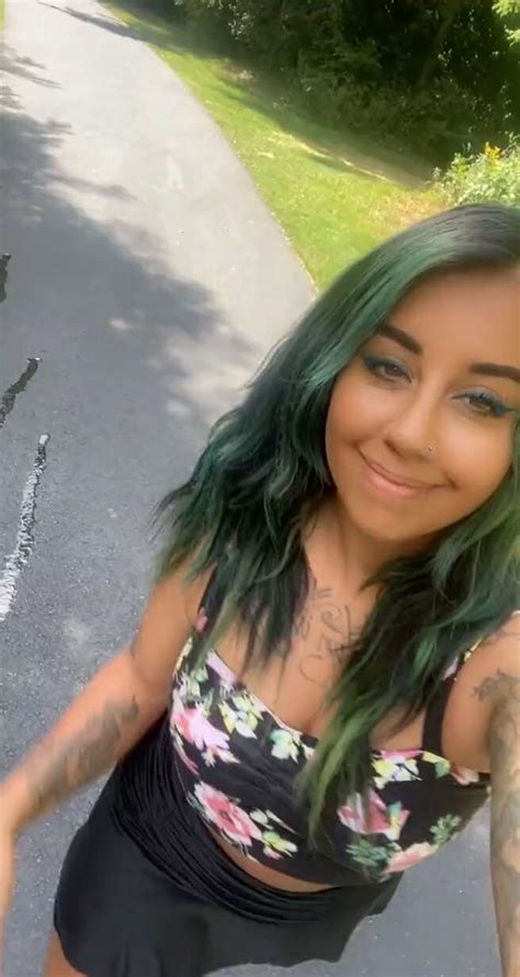 Beautiful Green Hair Babe Shows Her Piss Puddle ThisVid