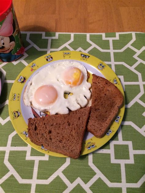How to make healthy heart shaped eggs: spray a pan with pam. Then put