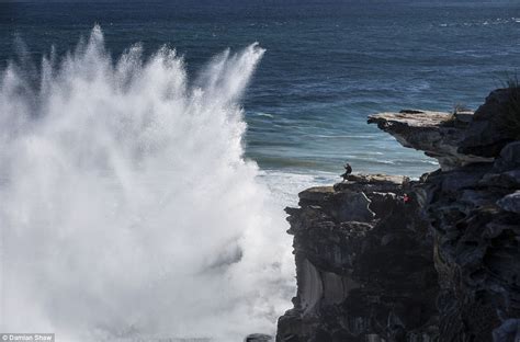 Man Stands Naked On A Cliff As Waves Batter The Headland In Sydney Daily Mail Online