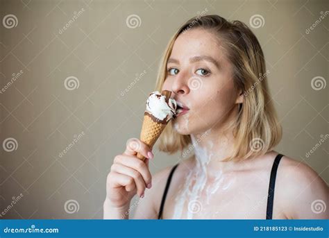 Blonde Licks A Waffle Cone Ice Cream Is Melting Erotically Draining Through The Body Of An