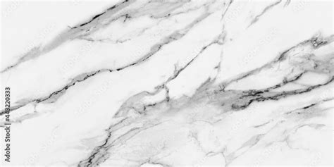 carrara statuarietto white marble  grey veins   surface