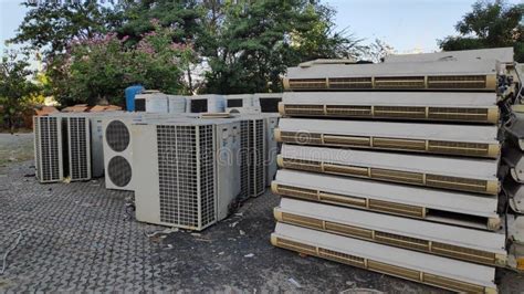 A Pile Of Discarded Or Damaged Air Conditioners Stock Photo Image Of