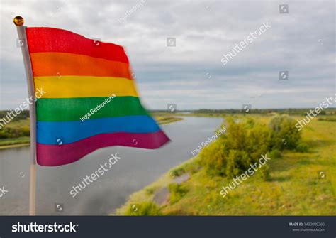 Colorful Illuminated Rainbow Gay Pride Flag Stock Photo