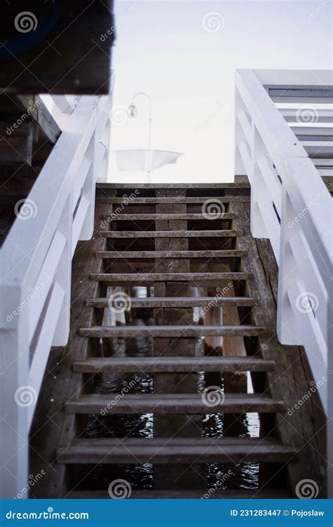 Wooden Stairs Leading To Pier By Sea Stock Image Image Of River Lake