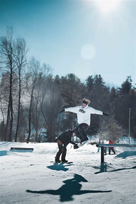 Person Jumping While Using Ski Board · Free Stock Photo