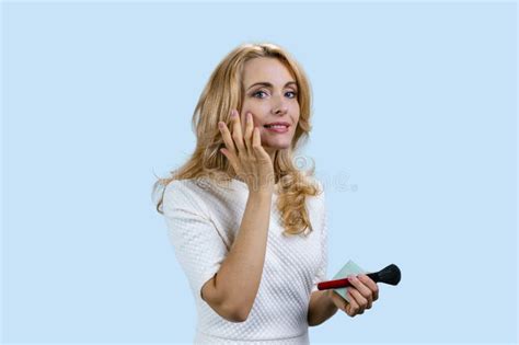 Happy Blonde Mature Woman Applying Cosmetic Powder Stock Image Image Of Brush Makeover