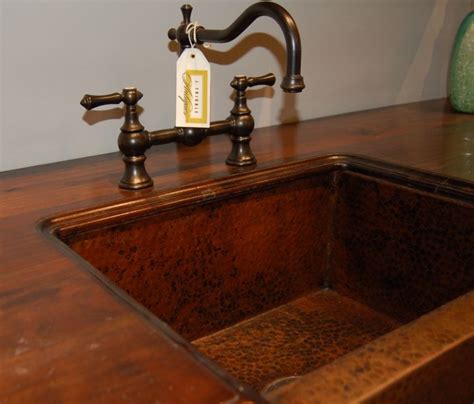 Another great Waterstone Faucet paired with the hammered copper sink ...