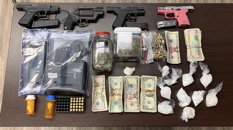 3 arrested, 1 wanted after drugs, guns seized in Laurens Co.