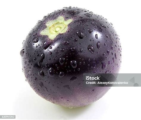 Violet Tomato Stock Photo Download Image Now Purple Tomato Cut