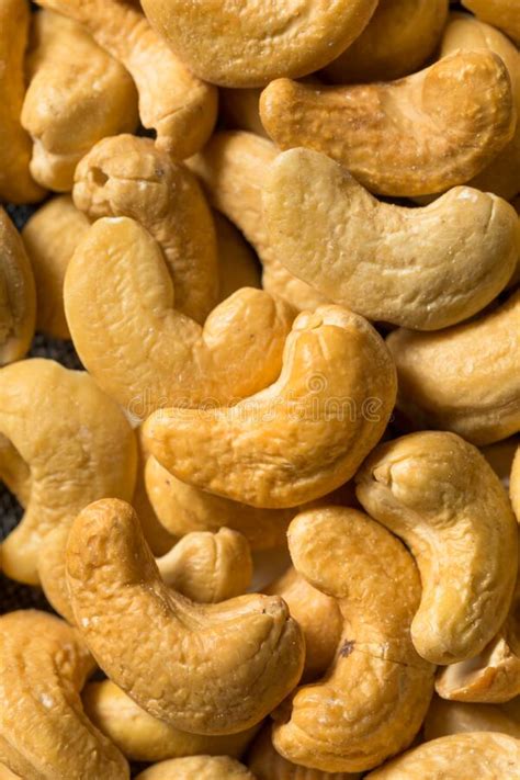Shelled Cashew Nuts Flying Above White Background Levitation Effect