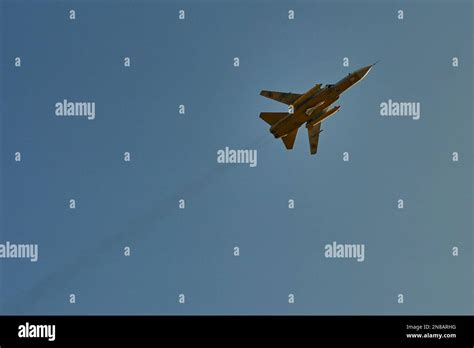 Corrects Type Of Plane A Ukrainian Air Force Sukhoi Su 24 Flies Over