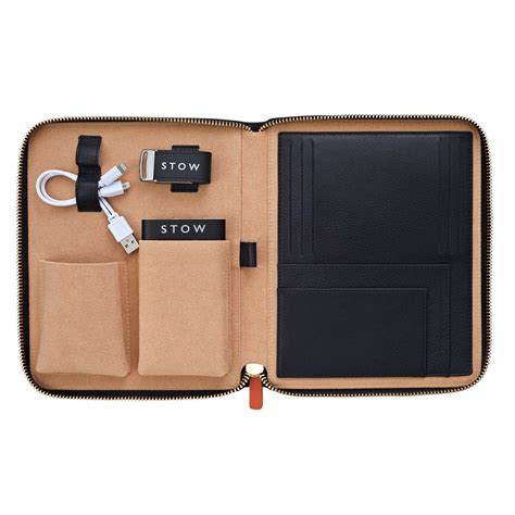 An Executive Leather Tech Case For Travel With Optional Functional Tech Accessories Including