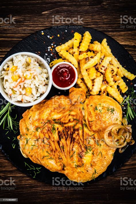 Schnitzel French Fries And Vegetables Stock Photo Download Image Now