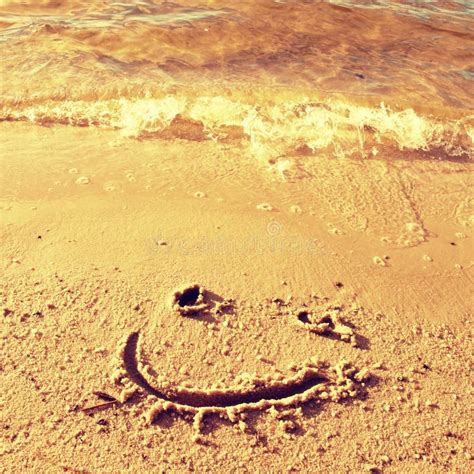 Funny Smile Face Drawn In Wet Sand Of Beach Stock Photo Image Of Sand