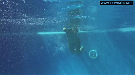 Kittina Submerges Herself In To The Hot Pool