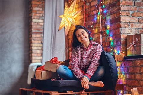 Brunette Female In A Room With Christmas Decoration Stock Photo Image Of Pleasant Brick