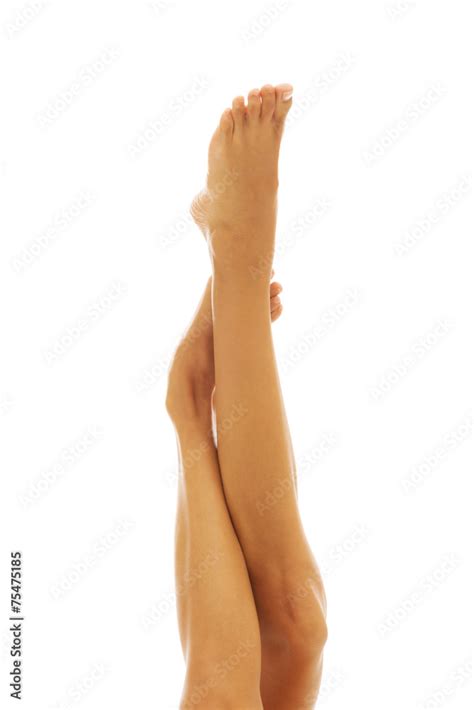 Front View Of Woman Hand Touching Nude Woman S Leg Stock Photo Adobe Stock