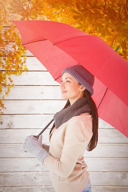 Premium Photo Smiling Brunette Holding Red Umbrella Against Autumn