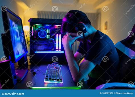 Asian gamer has eyes pain stock image. Image of media - 180627837