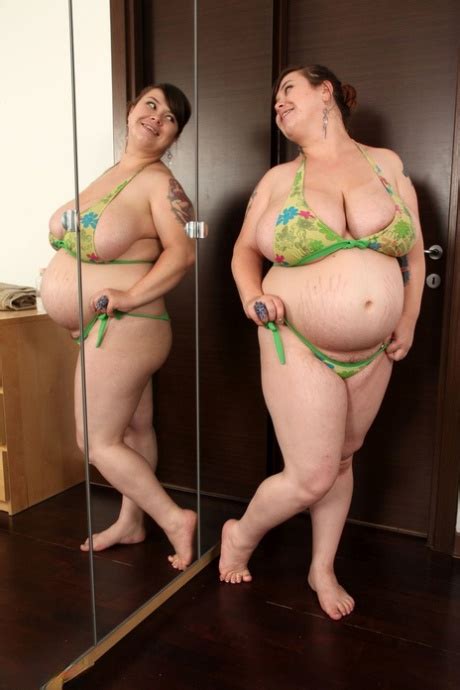 Brunette BBW Roxanne Miller Exposes Her Monster Boobs And Oils Them CoedCherry