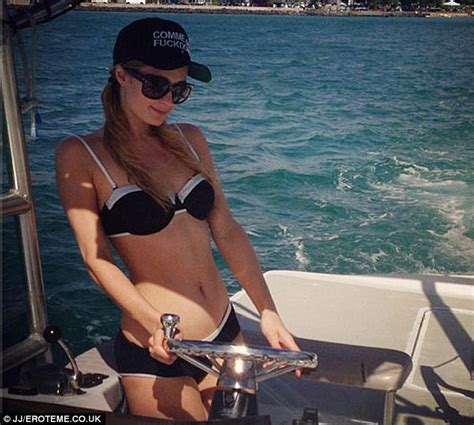 This Is Your Captain Speaking Paris Hilton Wears A Tiny Bikini To