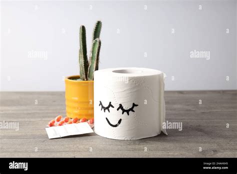 Concept Of Healthcare With Hemorrhoids Accessories On Wooden Table