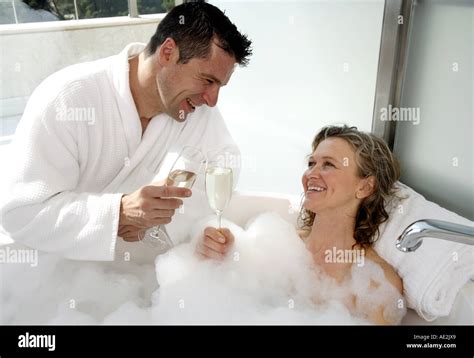 Mature Couple Having Fun In The Bathtub Stock Photo Alamy