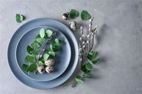 Premium Photo Eucalyptus And Pussy Willow Twigs With Quail Eggs On Plate As Decor For Easter