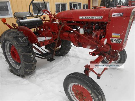 Farmall 140 With Fast Hitch And Rear Blade Tires In Pa
