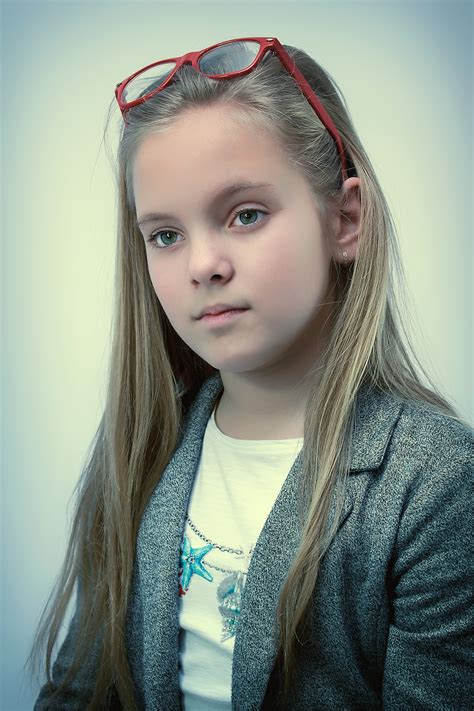 cute-young-girl-portrait-with-sunglasses-above-face image - Free stock ...