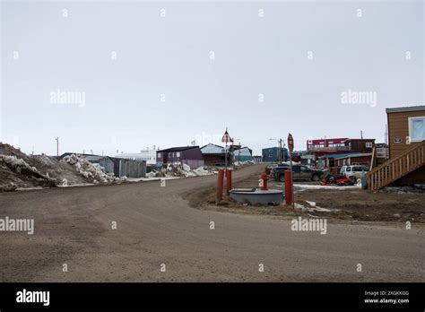Red Fire Hydrant Protected By Bollards In Iqaluit Nunavut Canada