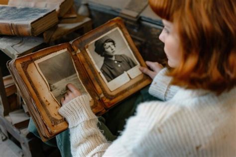 Premium Photo Woman Viewing Old Black And White Photos In A Vintage